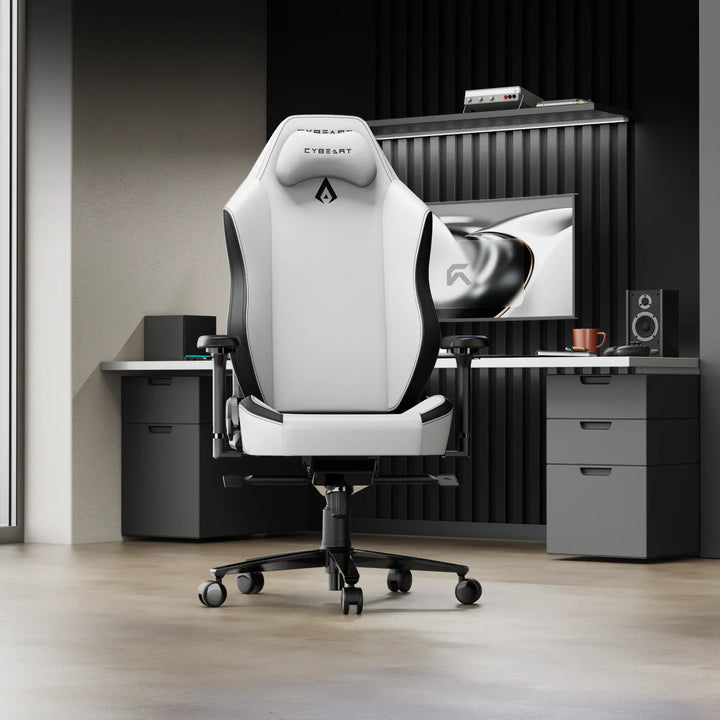 APEX Arctic White gaming chair at a desk